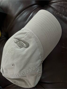 Cream Nike Club Unstructured Futura washed cap with Nike swoosh.